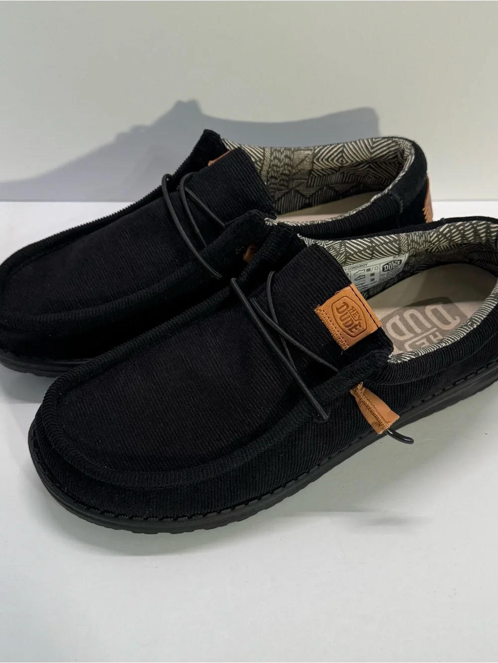 HEYDUDE Black Canvas Slip-On Loafers with Tan Accents
